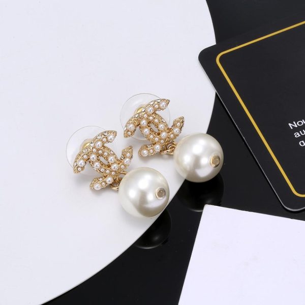 réplica,joyas,joyería,1:1,replica,fake,lujo,barato Pendientes colgantes con perlas y estampado de doble C de Chanel