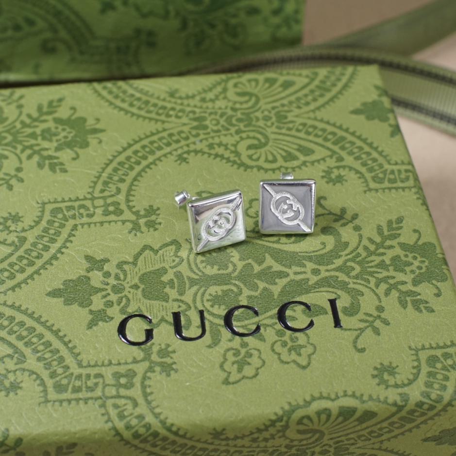 réplica,joyas,joyería,1:1,replica,fake,lujo,barato réplica,joyas,joyería,1:1,replica,fake,lujo,barato Aretes con doble G entrelazada de sarga de Gucci