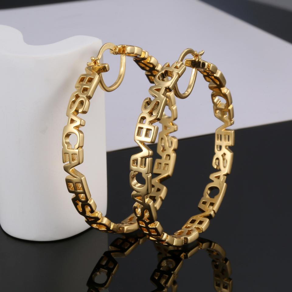 réplica,joyas,joyería,1:1,replica,fake,lujo,barato Pendientes con relieve de cara de Versace