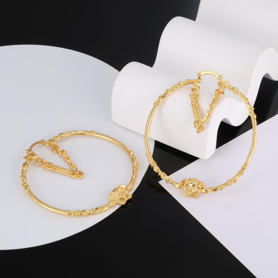 réplica,joyas,joyería,1:1,replica,fake,lujo,barato Pendientes con relieve de cara de Versace