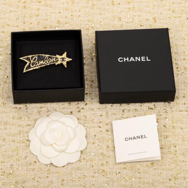 réplica,joyas,joyería,1:1,replica,fake,lujo,barato Broche Chanel con estrella de lava y letras en oro negro