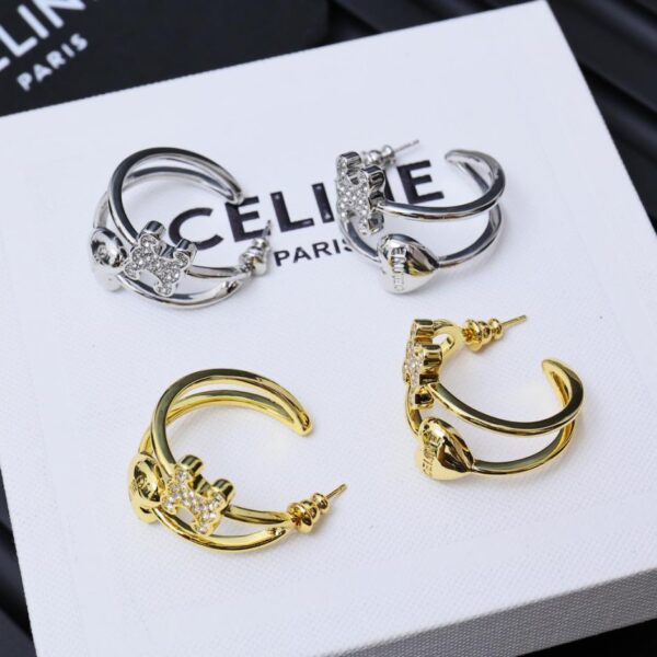 réplica,joyas,joyería,1:1,replica,fake,lujo,barato Pendientes de amor asimétricos populares del Arco de Triunfo de Celine (D069)