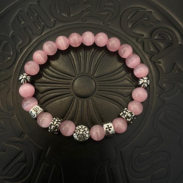réplica,joyas,joyería,1:1,replica,fake,lujo,barato [Calidad de mostrador] Pulsera clásica retro con forma de ojo de gato rosa y corazones cromados (F2ED)