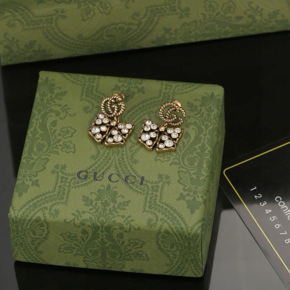 réplica,joyas,joyería,1:1,replica,fake,lujo,barato réplica,joyas,joyería,1:1,replica,fake,lujo,barato Aretes con lazo de doble G Gucci (F553)