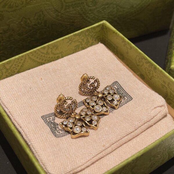 réplica,joyas,joyería,1:1,replica,fake,lujo,barato Pendientes con lazo Gucci Doble G entrelazada estilo clásico (42F8)