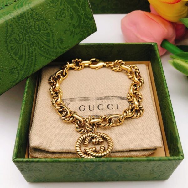 réplica,joyas,joyería,1:1,replica,fake,lujo,barato Brazalete con GG entrelazadas de traje de Gucci (6B88)