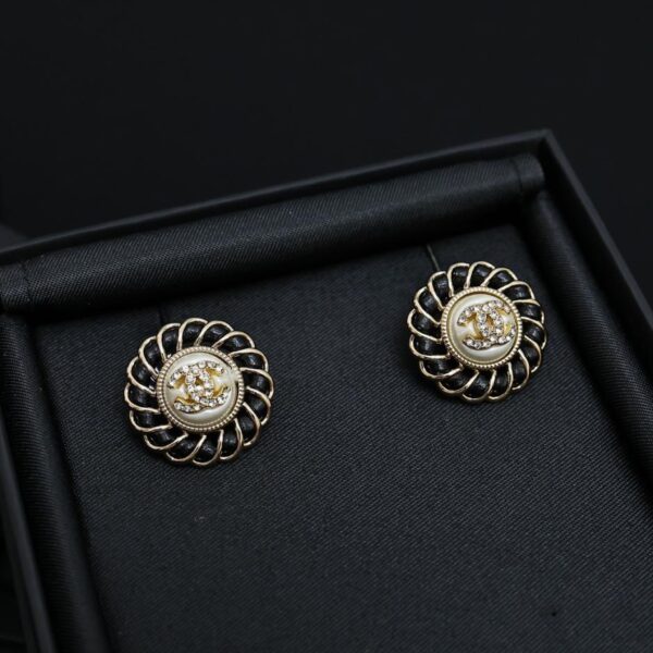 réplica,joyas,joyería,1:1,replica,fake,lujo,barato Aretes de girasol de cuero en oro negro de 24 quilates de Chanel (FFD8)