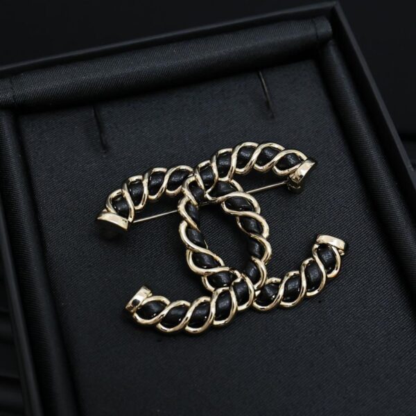 réplica,joyas,joyería,1:1,replica,fake,lujo,barato Aretes de girasol de cuero en oro negro de 24 quilates de Chanel (FFD8)