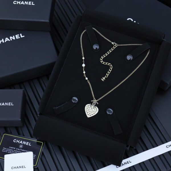réplica,joyas,joyería,1:1,replica,fake,lujo,barato Broche de cuero negro con frasco de perfume tejido nuevo de Chanel (5FC3)
