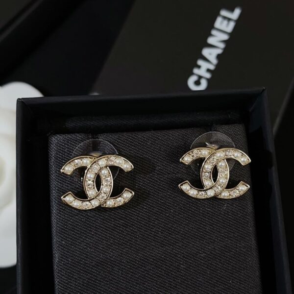 réplica,joyas,joyería,1:1,replica,fake,lujo,barato Pendientes Chanel de esmalte con forma de abanico de plátano en oro negro (O2IEG)