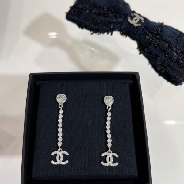 réplica,joyas,joyería,1:1,replica,fake,lujo,barato Pendientes Chanel 25s con plumas doble C de oro y diamantes (H2CI3)