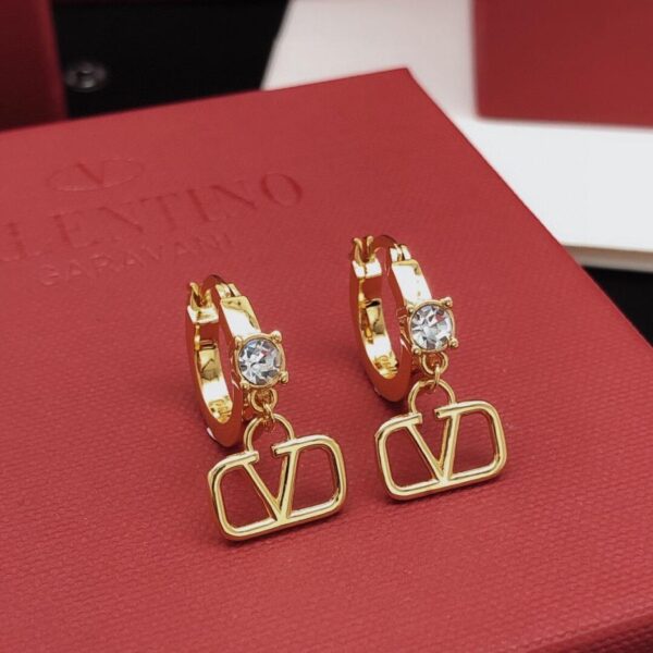 réplica,joyas,joyería,1:1,replica,fake,lujo,barato Pendientes Valentino de último modelo con forma de gancho, de latón ZP, en blanco diamante (LCND7)
