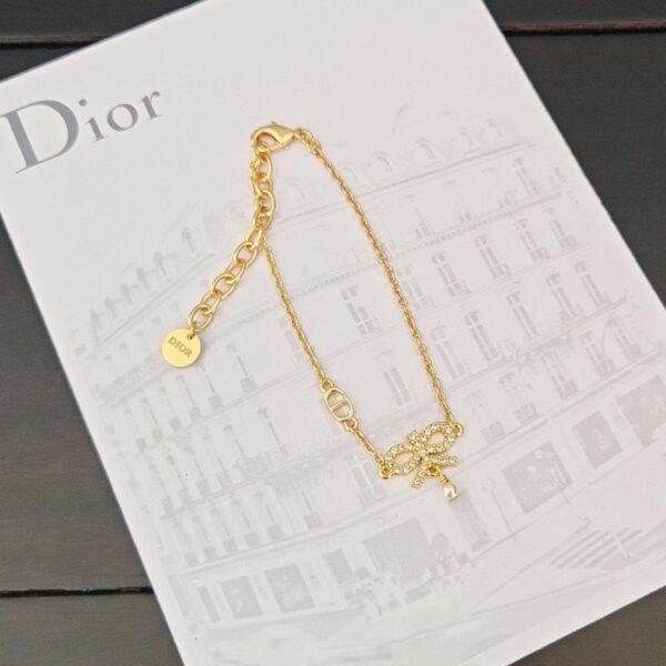 réplica,joyas,joyería,1:1,replica,fake,lujo,barato Los últimos pendientes de gota de agua dorados con perla de Dior, fabricados en latón ZP (15BBO)