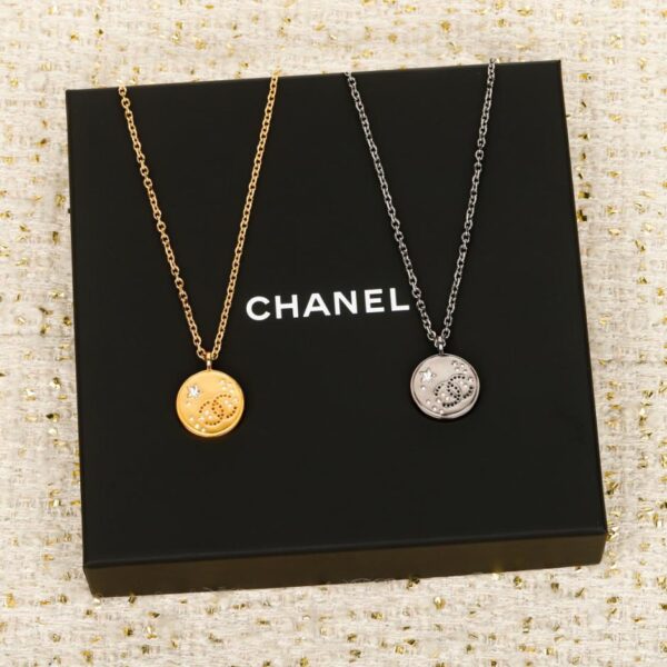 réplica,joyas,joyería,1:1,replica,fake,lujo,barato Boutique / Pendientes Chanel de doble C en forma de corazón en negro y dorado (8AGSN)