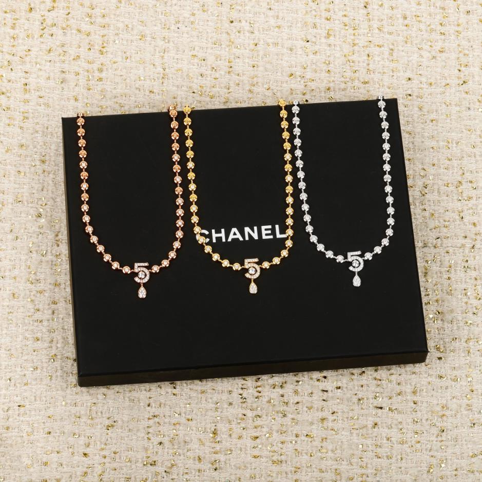 réplica,joyas,joyería,1:1,replica,fake,lujo,barato réplica,joyas,joyería,1:1,replica,fake,lujo,barato Boutique / Collar Chanel Eternal N°5 hecho a medida con oro auténtico y diamantes (2OSUB) disponible.