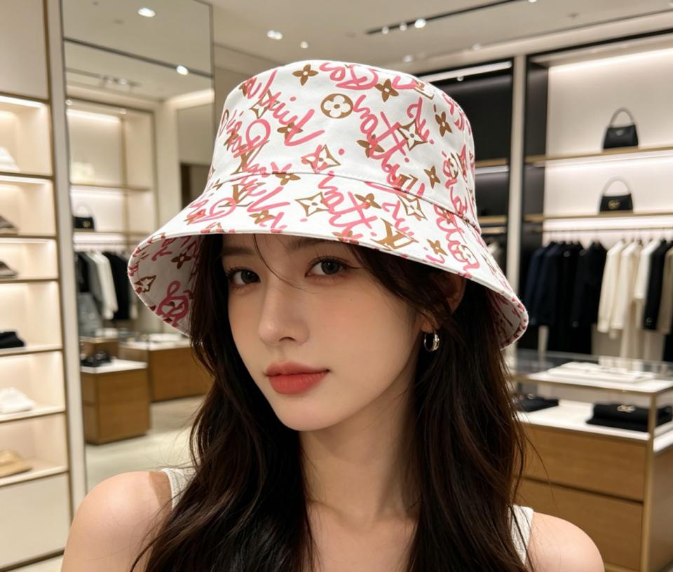 réplica,joyas,joyería,1:1,replica,fake,lujo,barato réplica,joyas,joyería,1:1,replica,fake,lujo,barato Sombrero tipo pescador con monograma de grafiti de Louis Vuitton (DB6B6Z)