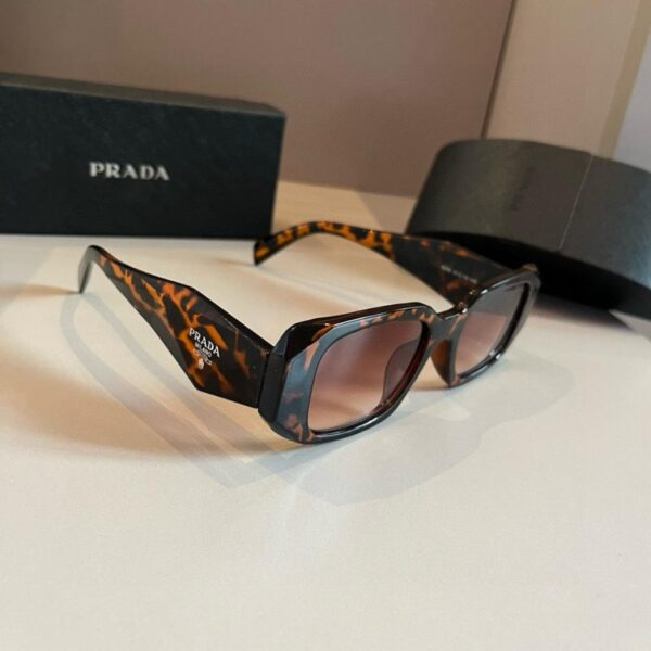 réplica,joyas,joyería,1:1,replica,fake,lujo,barato Gafas de sol PRADA: SPR17WF, el modelo más vendido de Prada y el estilo más popular de este año (71SECW)